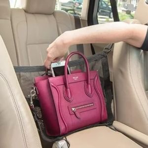 Car organizer purse holder pet keeper in back seat boundary.